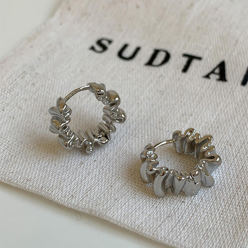 Stylish studs in modern ribbed design Stornfield