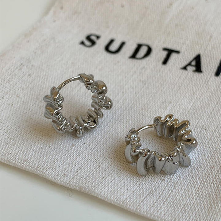 Stylish studs in modern ribbed design Stornfield