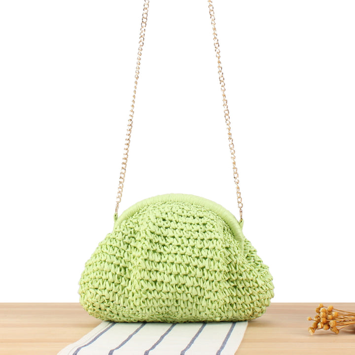 Shoulder bag made from handcrafted natural fibers with elegant chain decoration Stornfield