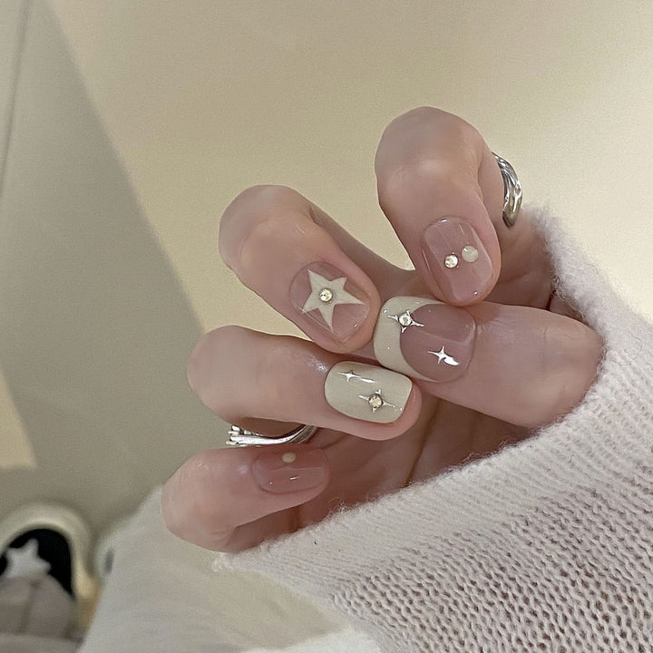 Artificial nails with elegant glitter accents Stornfield
