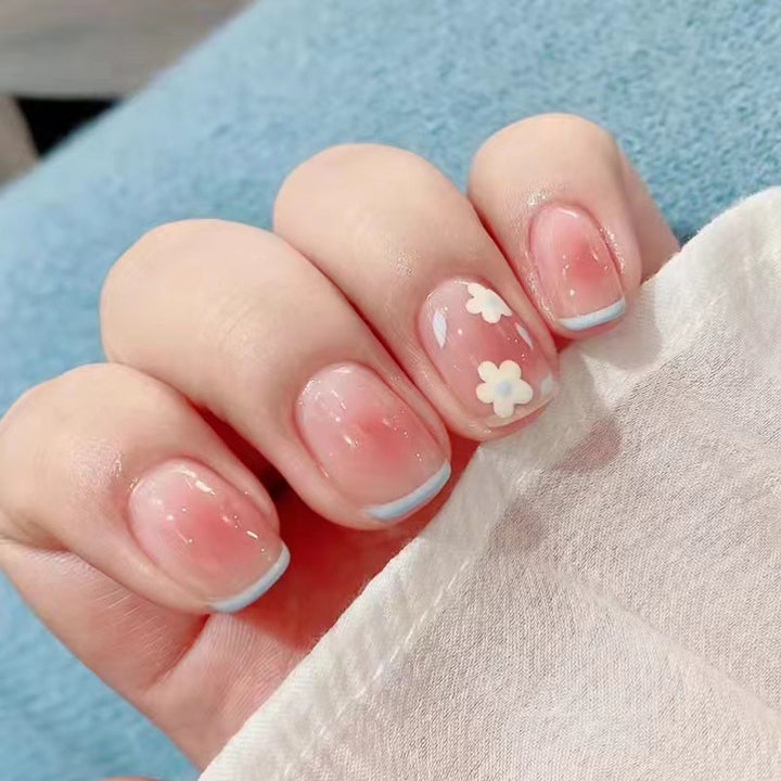 Artistic gel nails with delicate floral designs Stornfield