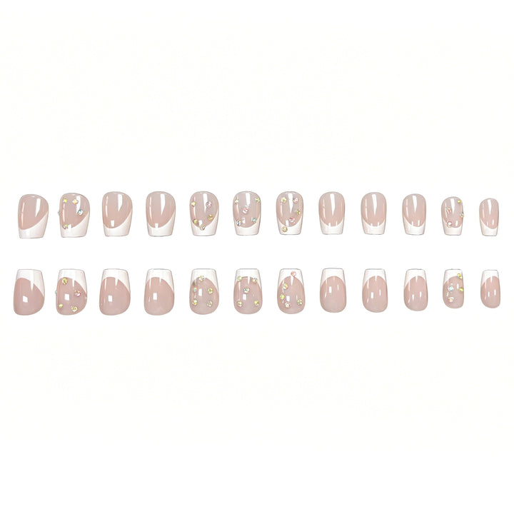 Elegant French Tip Nail Art Enhancements with Gem Accents Stornfield
