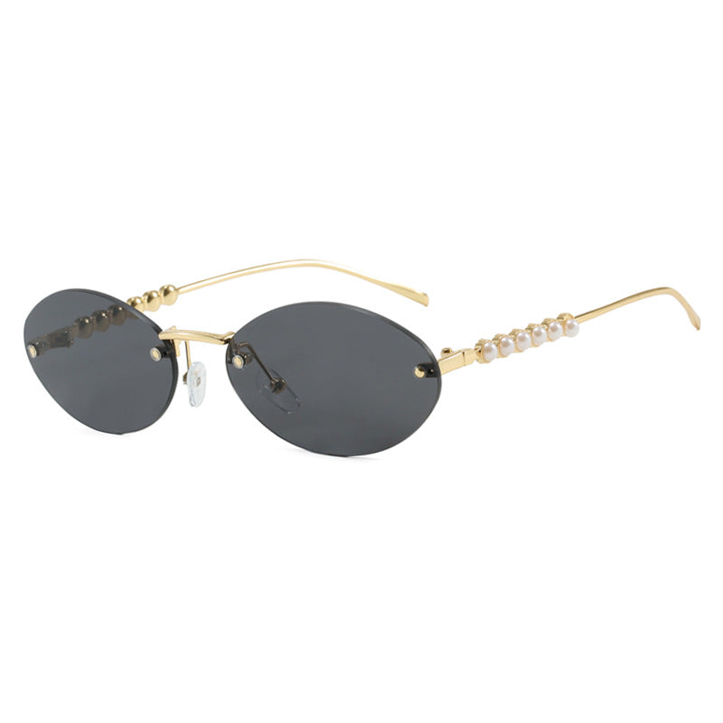 Women's stylish oval sunglasses with elegant embellishments Stornfield