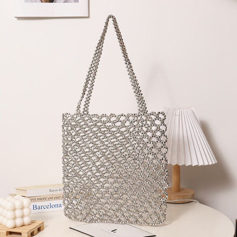 Sparkling Net Handbag Made of Braided Material Stornfield