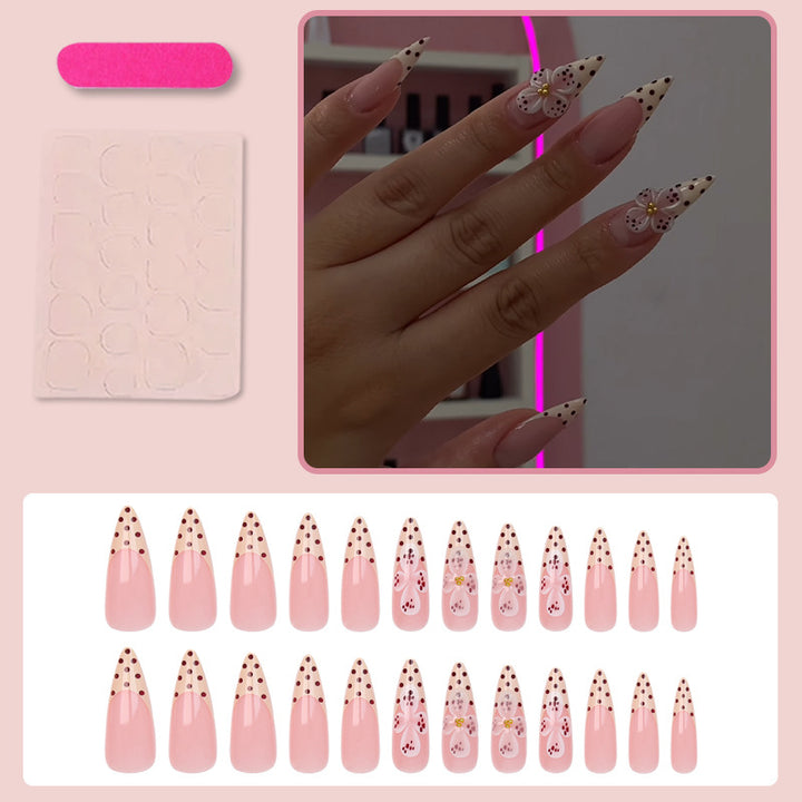 Art nail set with elegant flower and dot designs Stornfield