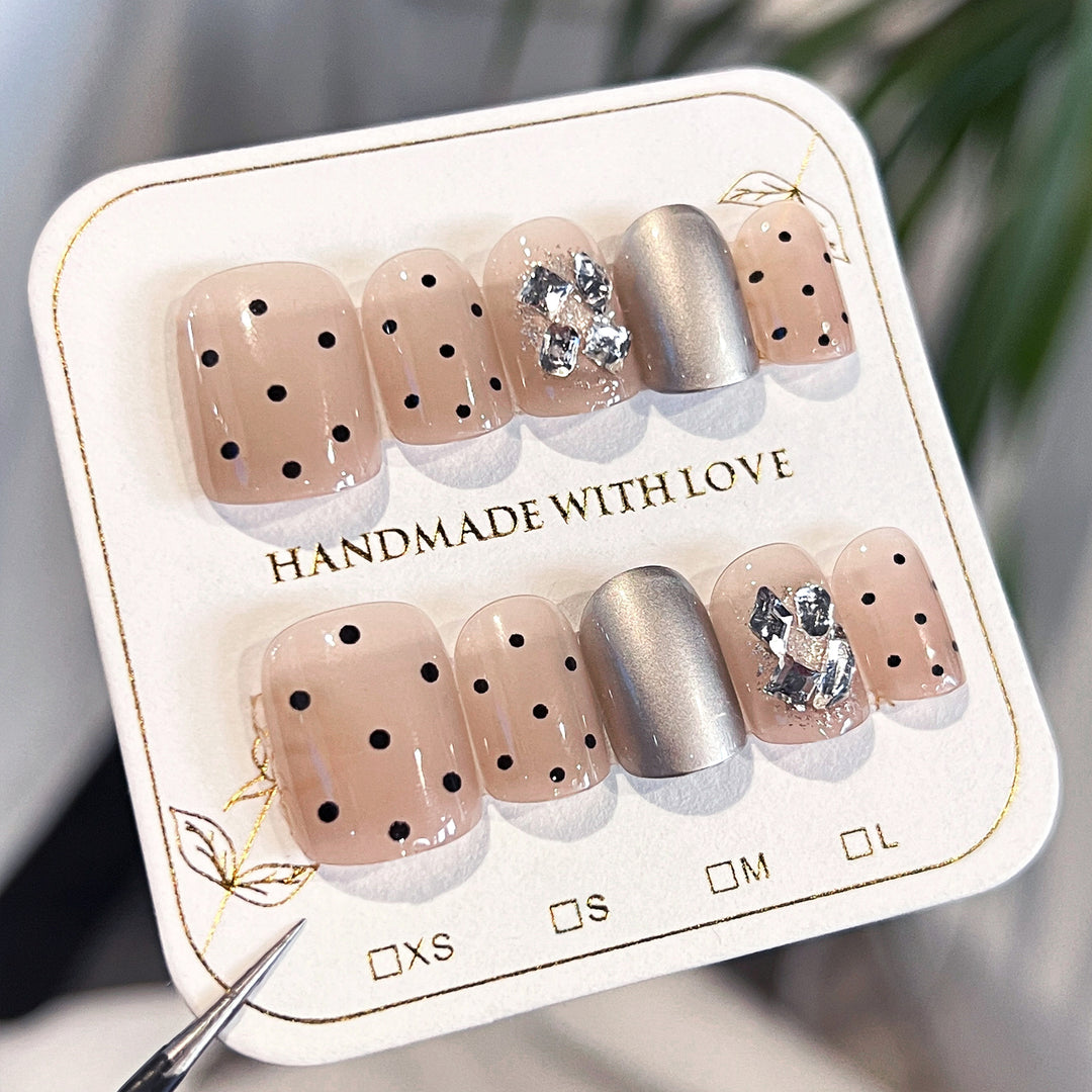 Artificial nail extensions with elegant accent decoration Stornfield