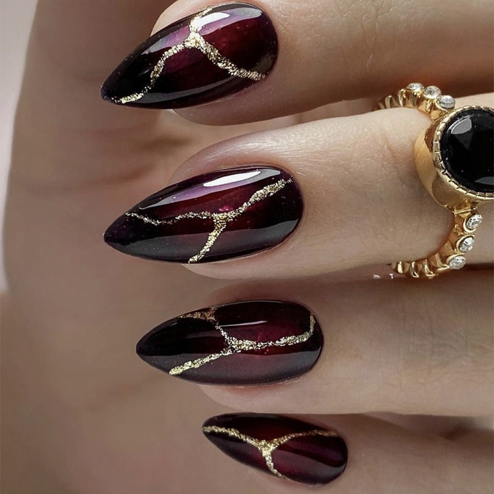 Acrylic nail set with glamorous accents and high-gloss finish Stornfield