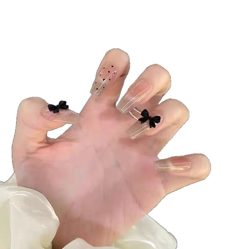 Artificial nails with playful bow design Stornfield
