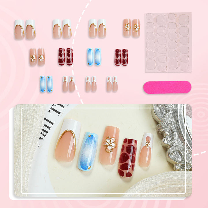 Artistic Press-On Nail Set with Floral Embellishments