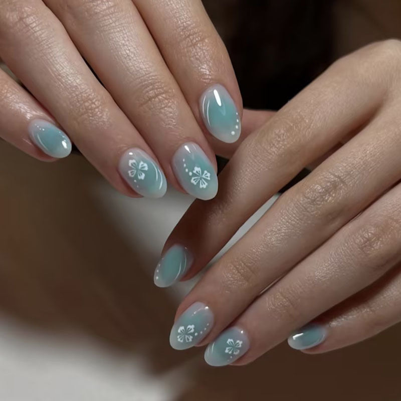 Artificial nail set with floral decorations and glossy finish Stornfield