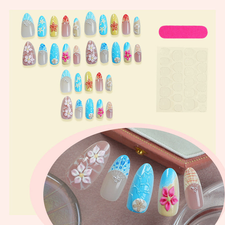 Elegant artificial nail set with floral details and glitter accents Stornfield