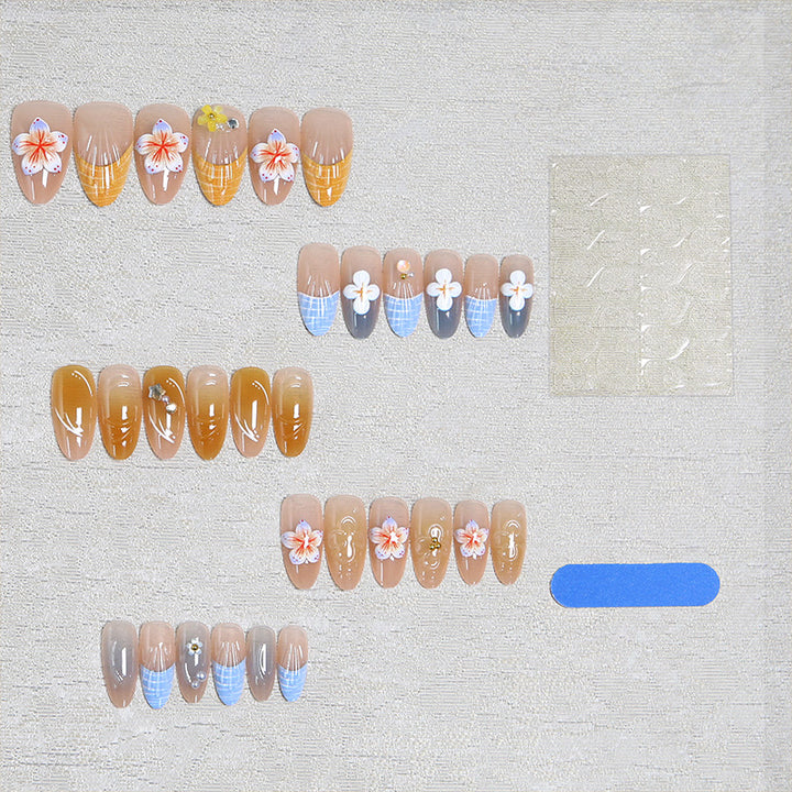 Acrylic nail set with aesthetic floral accents and gloss finish Stornfield