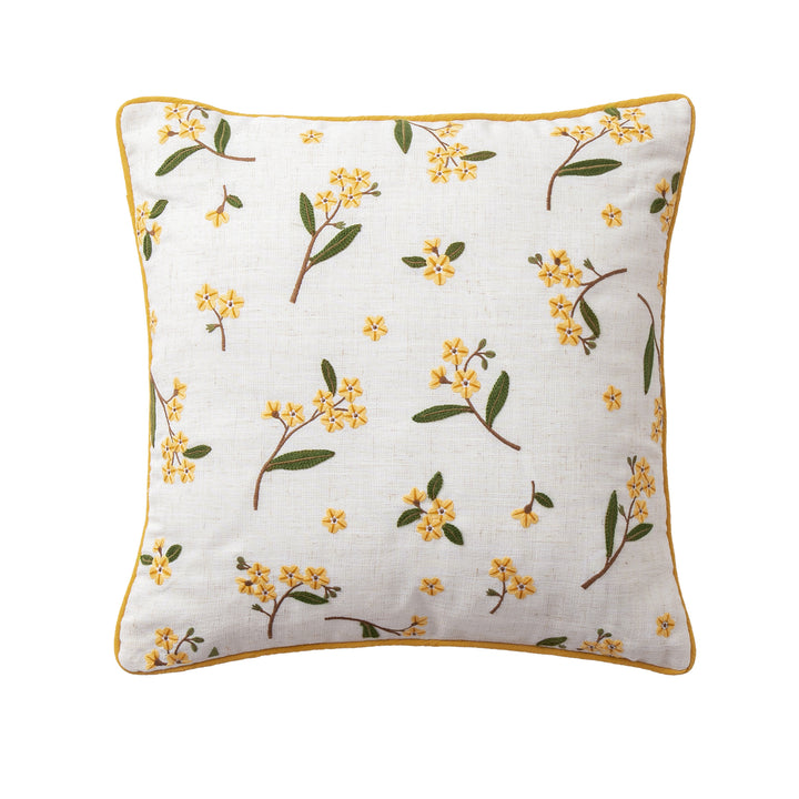 Decorative embroidered cushion cover made of linen blend with floral yellow flower appliqué and piping Stornfield