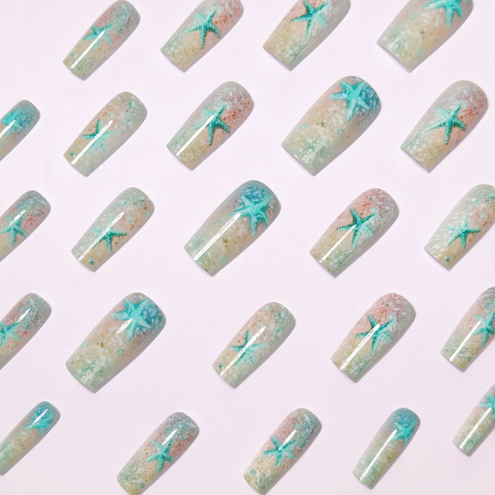 Glittering artificial nails with maritime star motif Stornfield