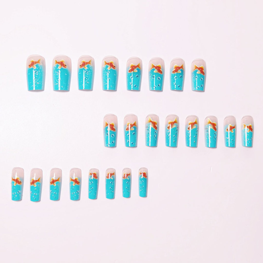 Artificial nail design with golden fish Stornfield