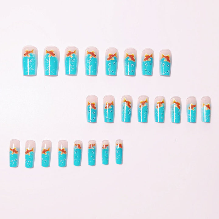 Artificial nail design with golden fish Stornfield