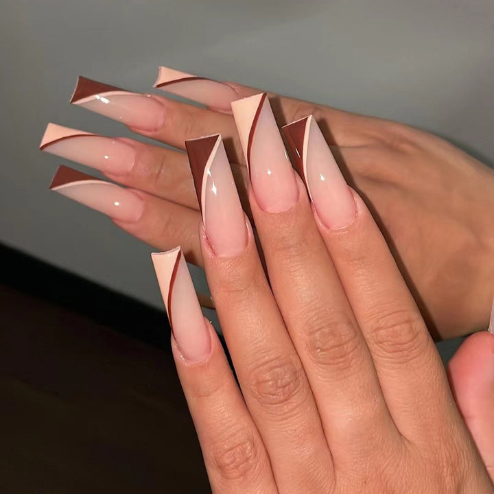 Artful stiletto nails with elegant gradient and geometric accents Stornfield
