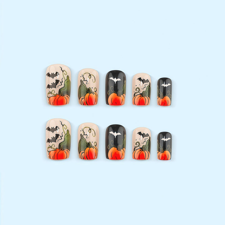 Artificial nails in Halloween design with pumpkins and ghosts Stornfield