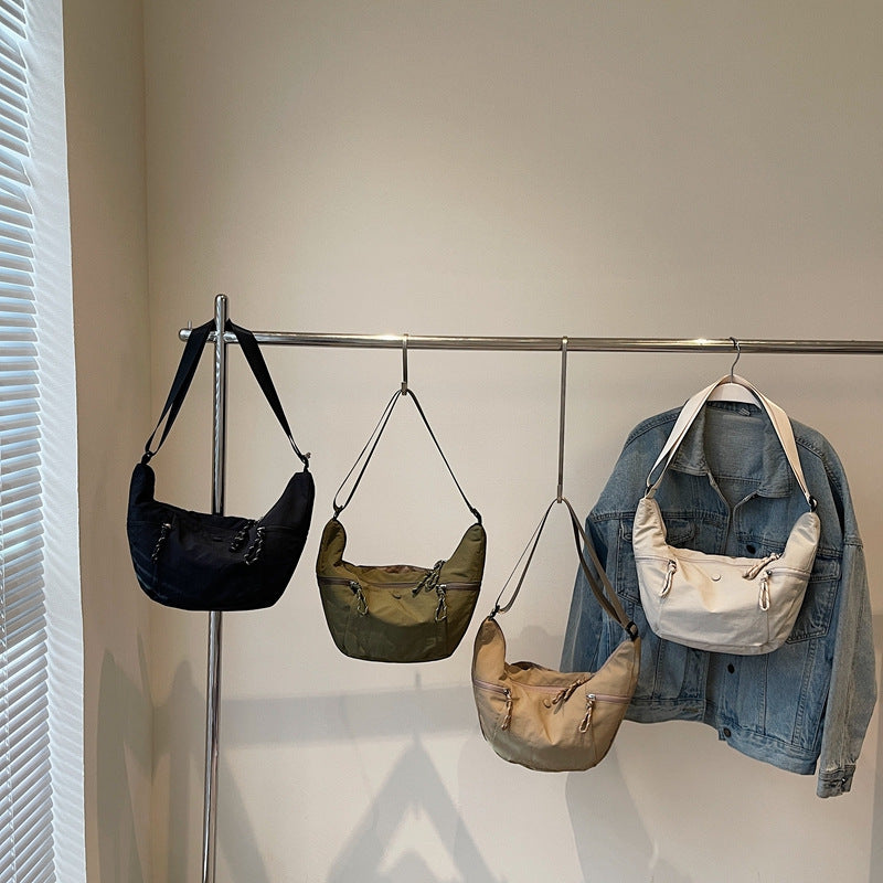 Practical shoulder bag with external zip pockets Stornfield