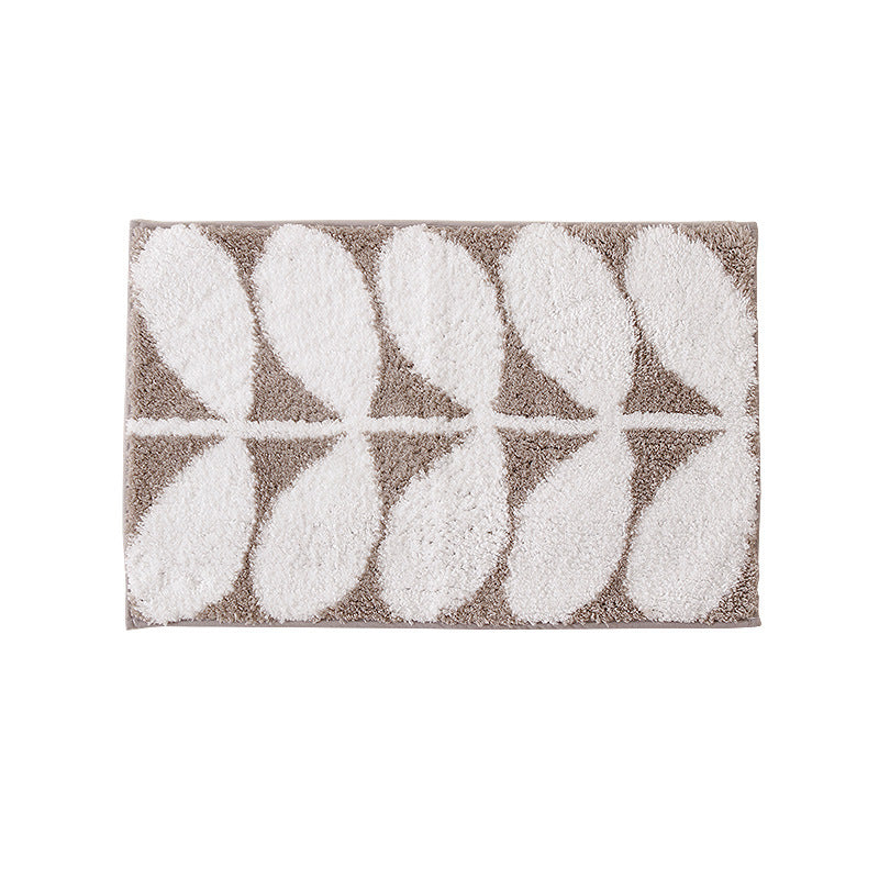 Fluffy bath mat in a graphic wave relief with anti-slip base Stornfield