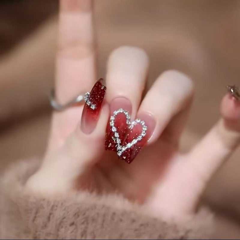 Artificial artificial fingernails with elegant heart accents Stornfield