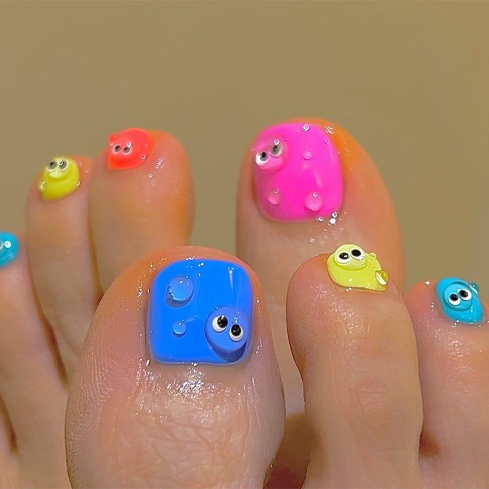 Nail art with colorful cartoon designs Stornfield