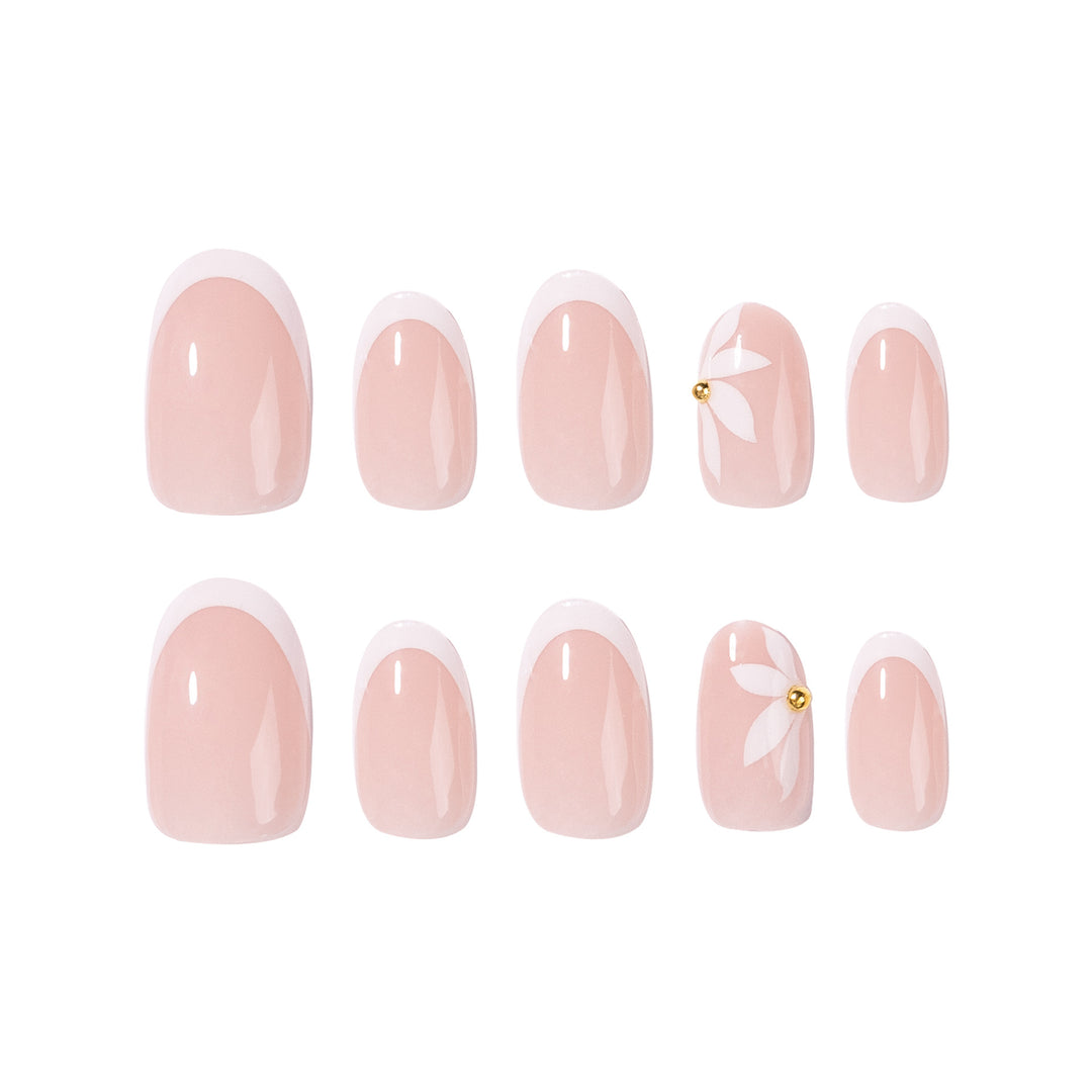 Artful French nails with delicate flowers and glitter accents Stornfield