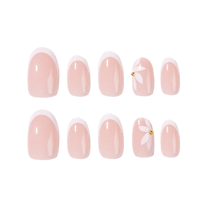 Artful French nails with delicate flowers and glitter accents Stornfield