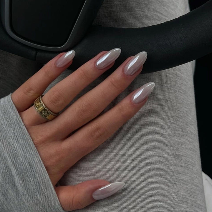 Artful stiletto nails with elegant shine details Stornfield