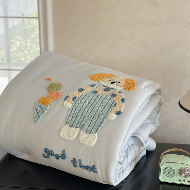 Children's bedding with tufted rabbit appliqué