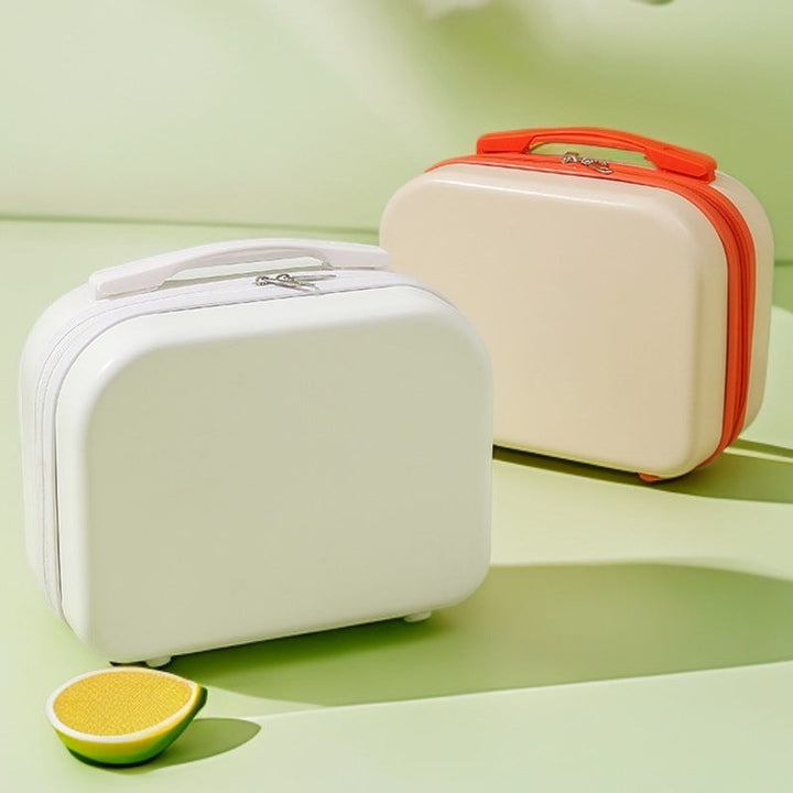 hard-shell travel vanity case with molded handle and double-zip closure Stornfield