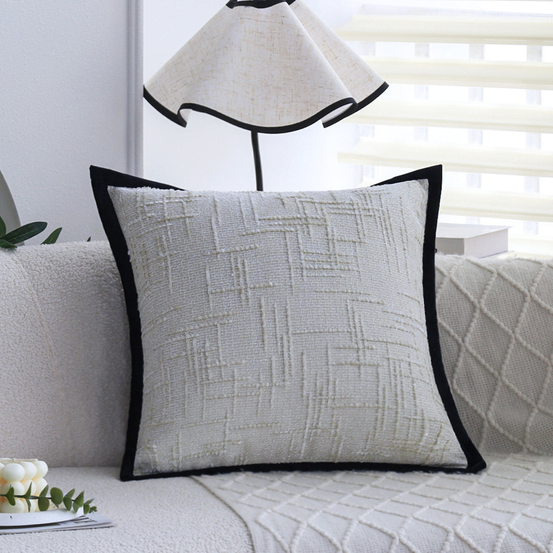 Square decorative cushion cover with structured grid tufting and contrasting piping Stornfield