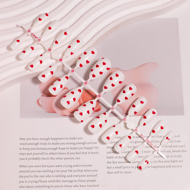 Trendy Heart-Decorated Nail Art Stornfield