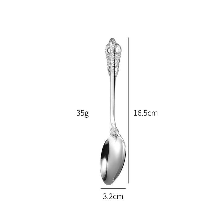 Elegant fish fork with artistic handle design Stornfield