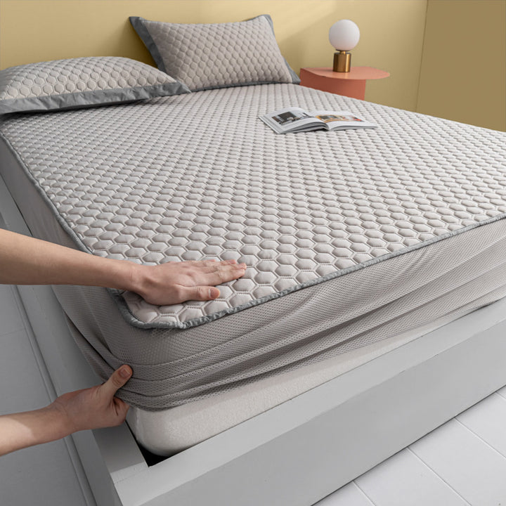 Quilted mattress topper complete set with elastic bed skirt and pillowcases