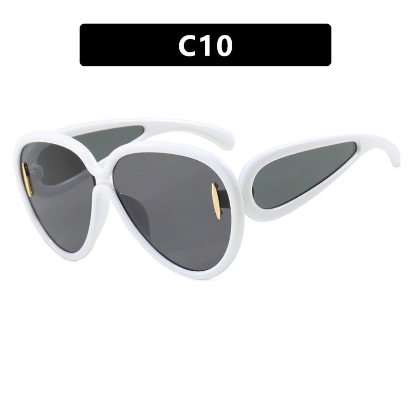 Women extravagant sunglasses in creative design Stornfield