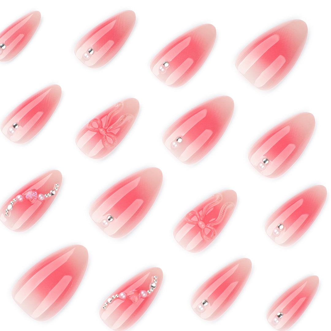 Artful nail extensions with delicate floral accents and glitter Stornfield