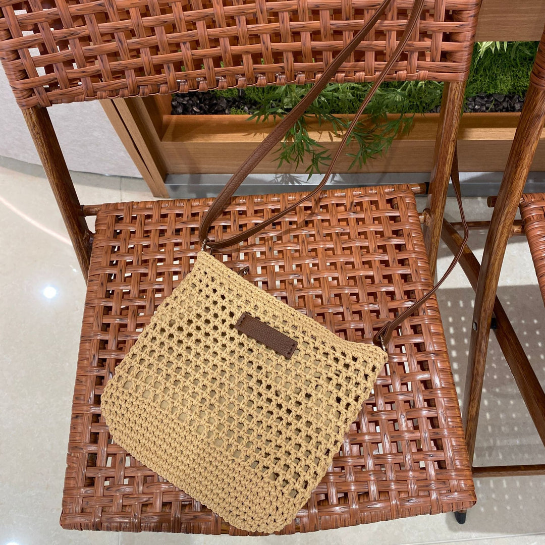 Hand-knotted shoulder bag with leather accent Stornfield