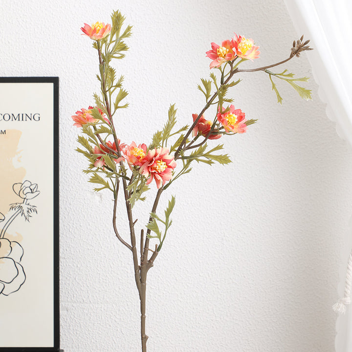 Elegant artificial flower branch with detail-loving blossoms