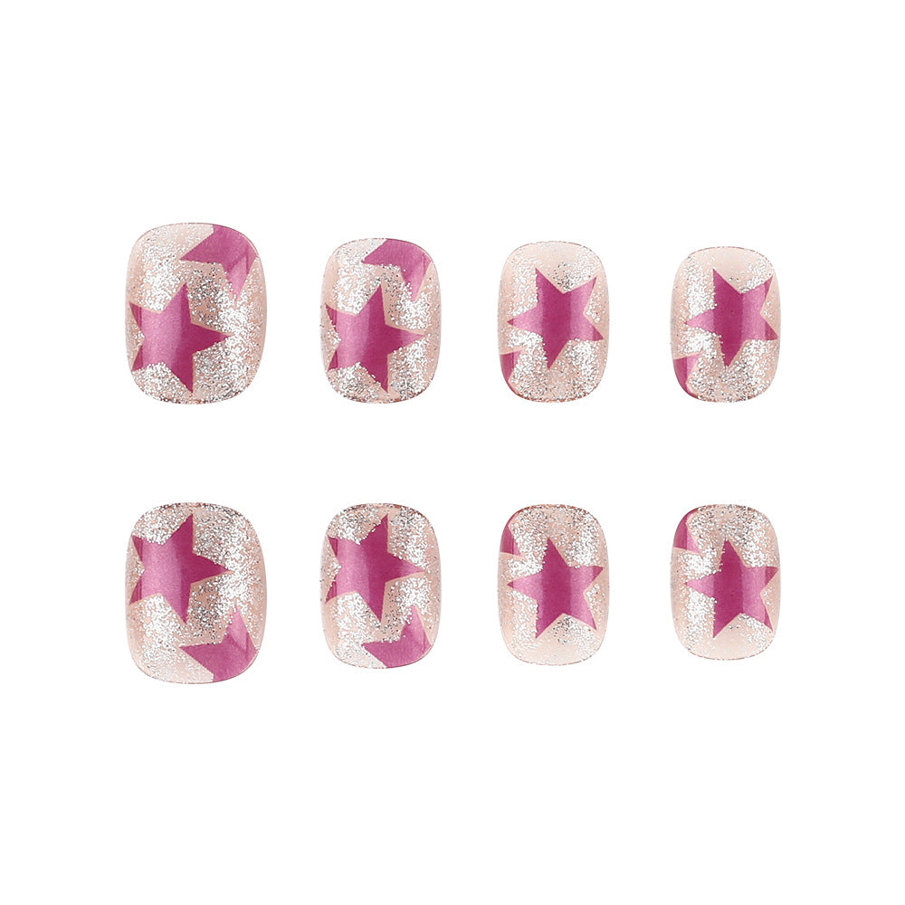 Artistic Press-On Nails with Star and Glitter Design Stornfield