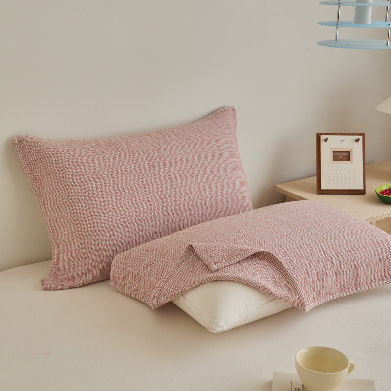 Textured cushion cover set made of cotton-linen blend with waffle structure