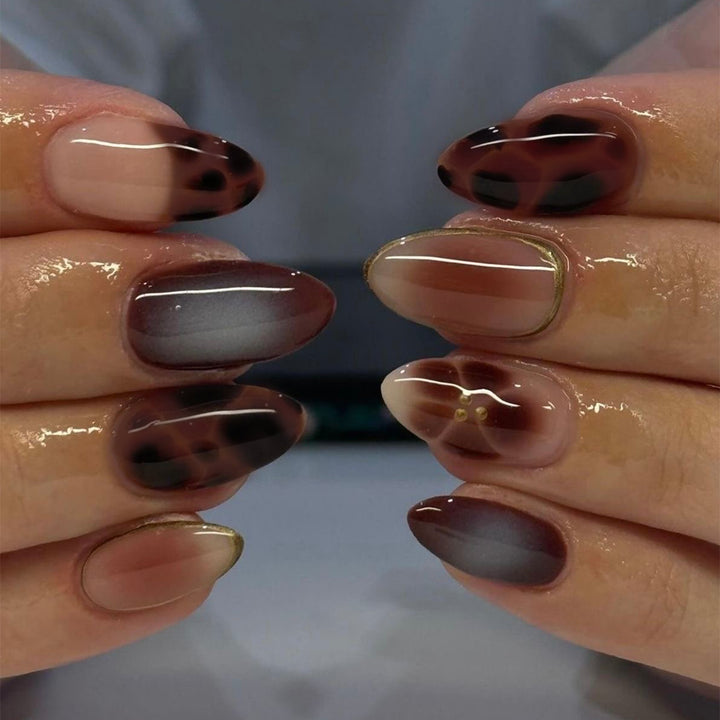 Glamorous acrylic stiletto nails with elegant glitter design Stornfield