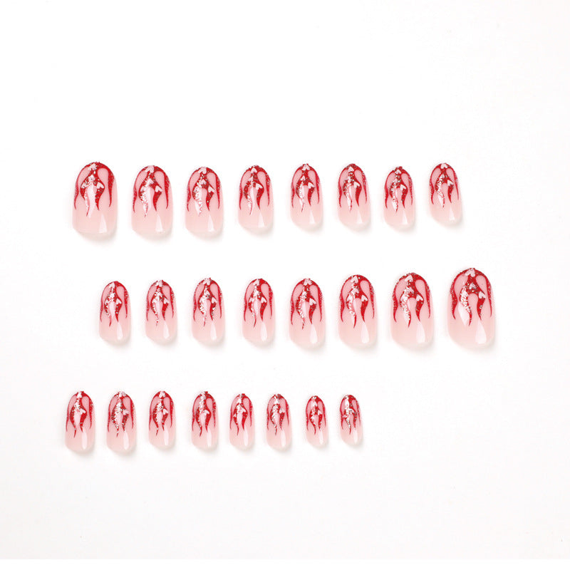 Artificial nail art with romantic heart and flame design Stornfield