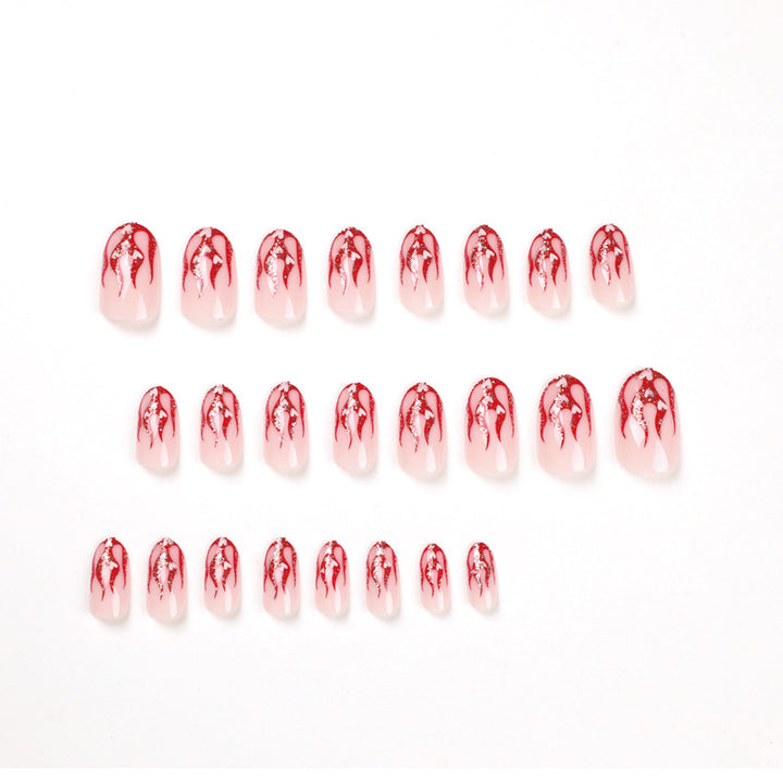 Artificial nail art with romantic heart and flame design Stornfield