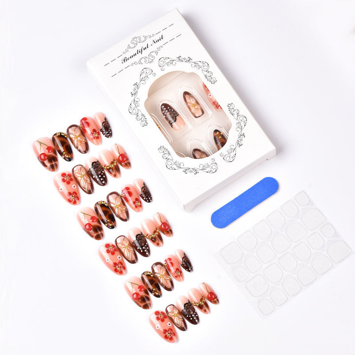 High-quality artificial nail creation with floral decorations Stornfield