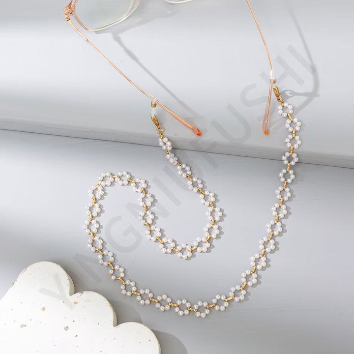 Elegant Pearl and Gold Chain Eyewear Holder Stornfield