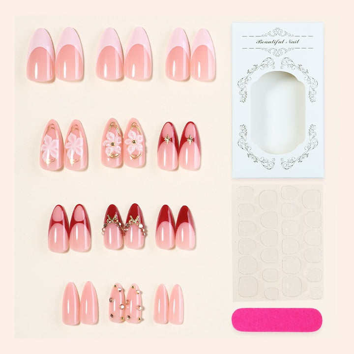 Acrylic nail set with floral accents and glamorous designs Stornfield