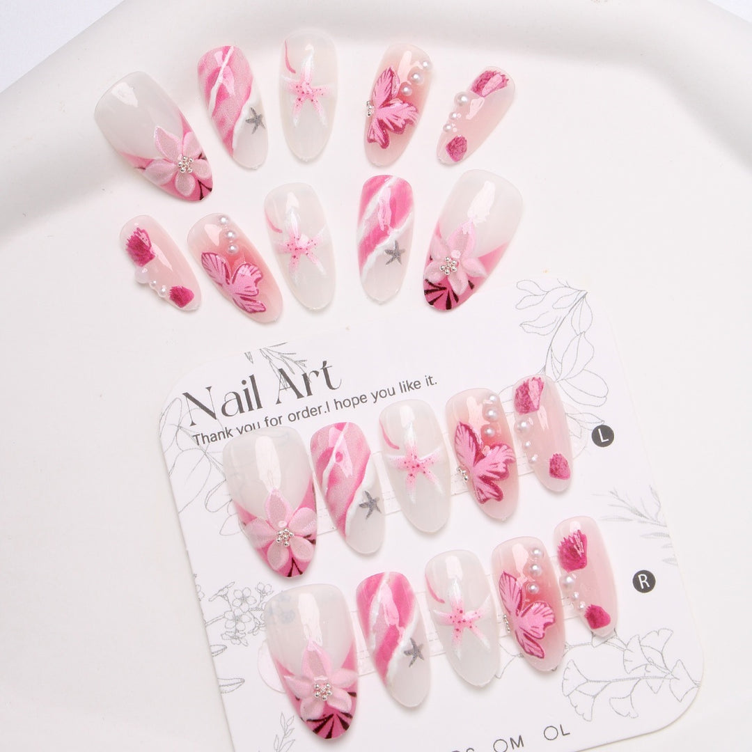 Acrylic nail set with elegant flower and glitter pattern Stornfield
