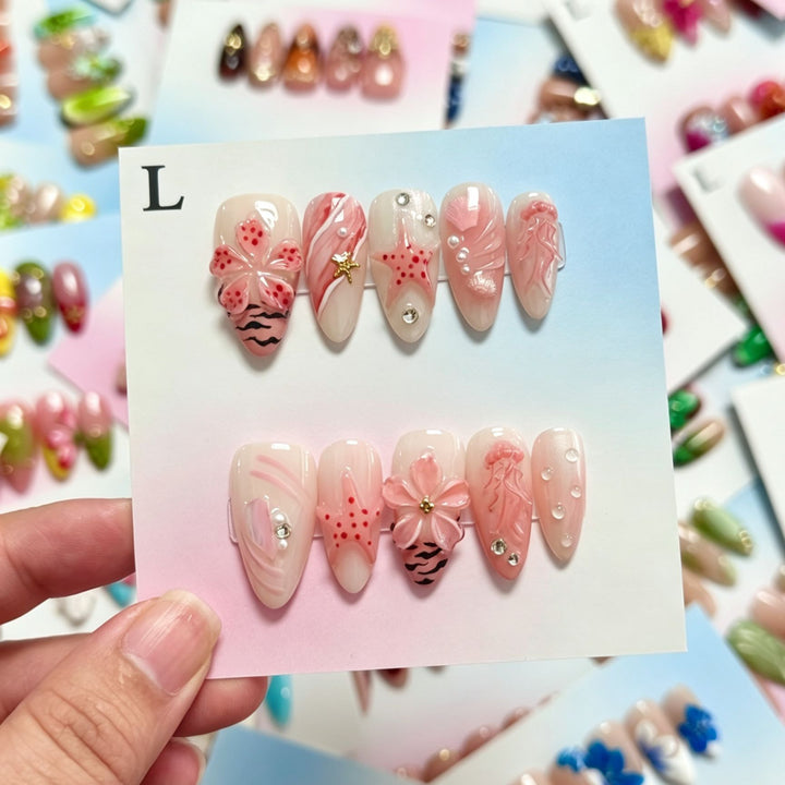 Decorative Press-On Nail Art Set Featuring Floral and Oceanic Designs