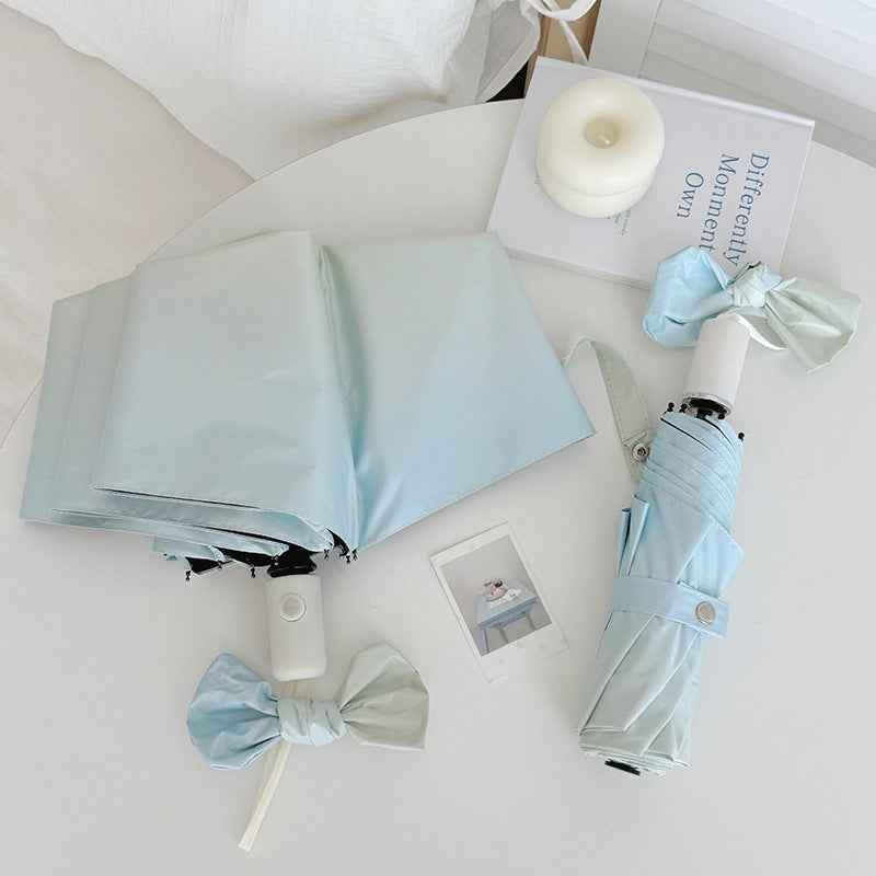 Women's Folding Travel Umbrella with Practical Storage System Stornfield